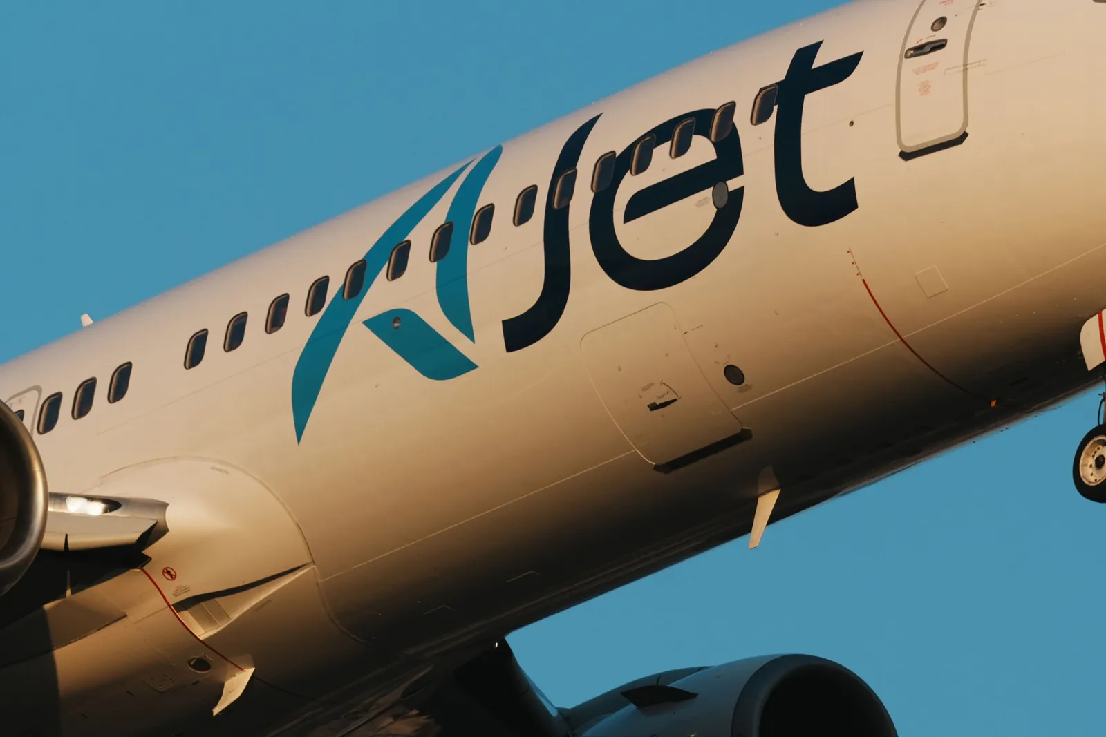 AJet passenger aircraft in flight against a blue sky