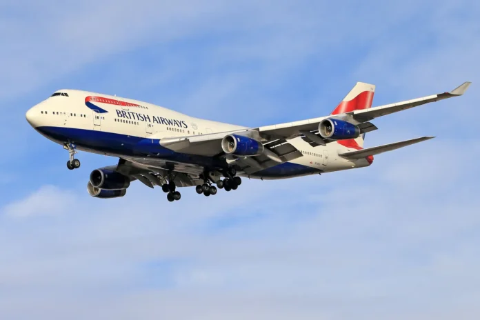 British Airways aircraft in flight against a blue sky